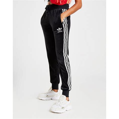 adidas 3 stripes velvet joggers.